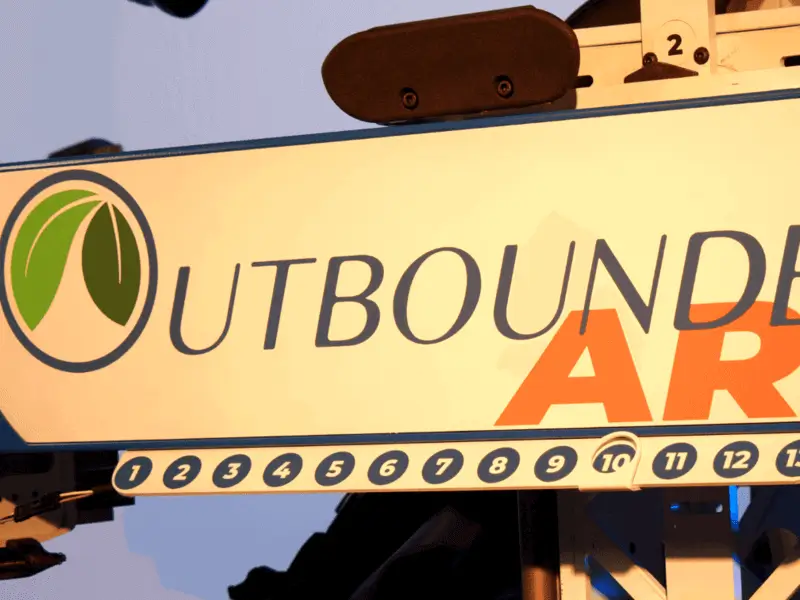 The turning mechanism on the machine with the OutbounderARS logo on the side of it